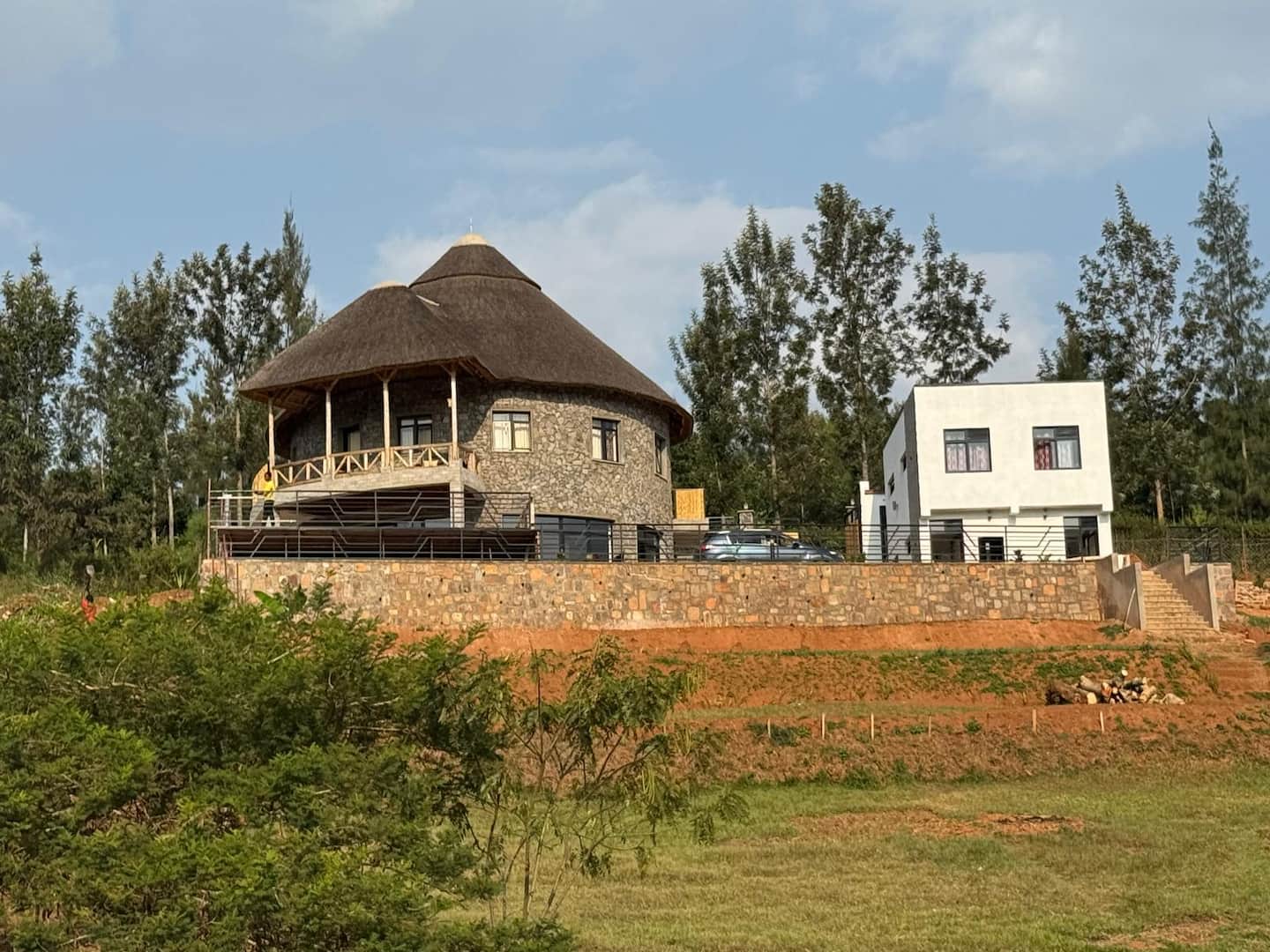 The two houses set in the green hills of Rwamagana