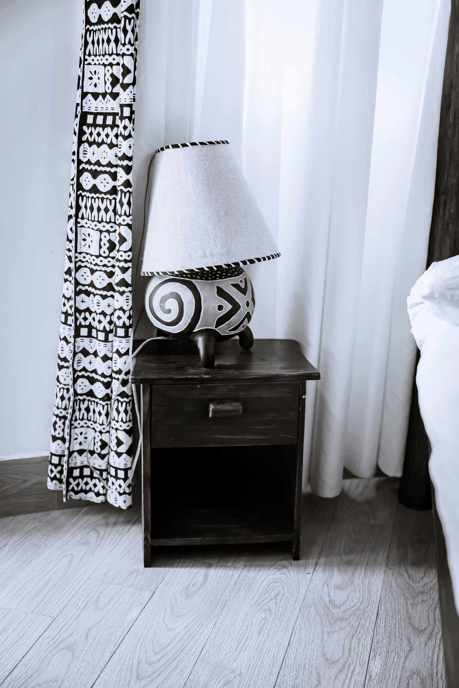 Nightstand and patterned lamp in black and white