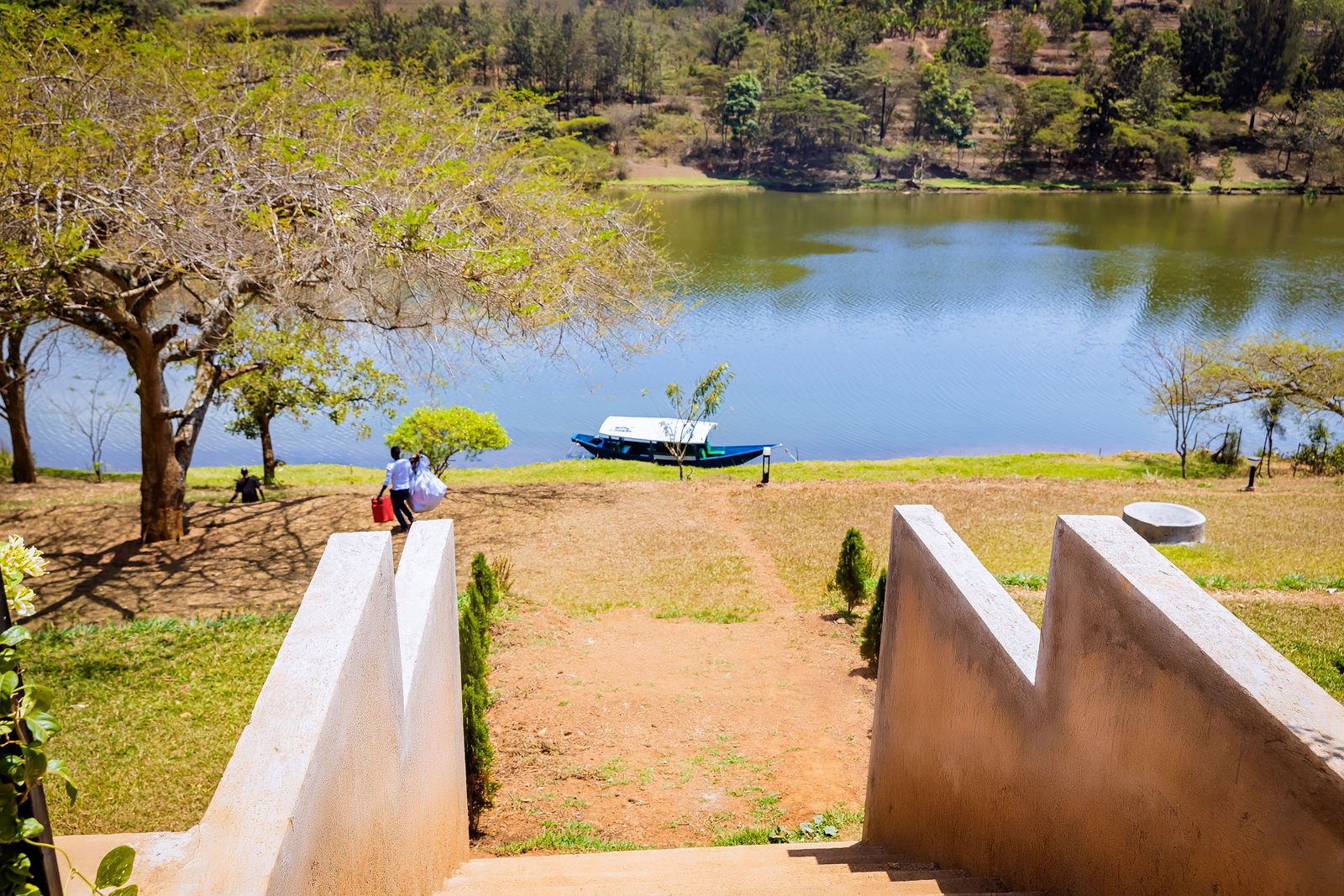 A boat moored on Lake Muhazi below the property
